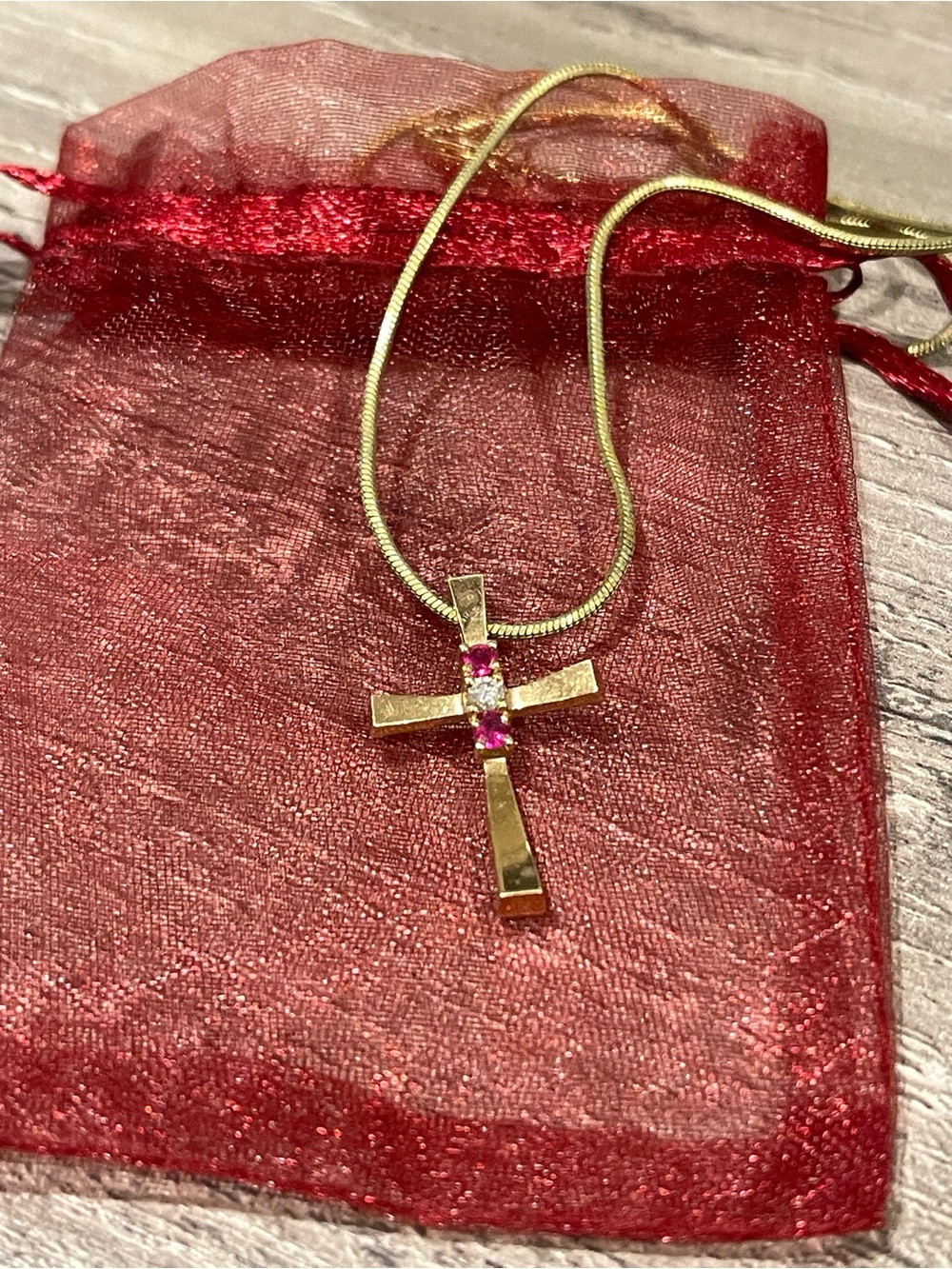 Gold Cross Necklace with Ruby Gem Accent